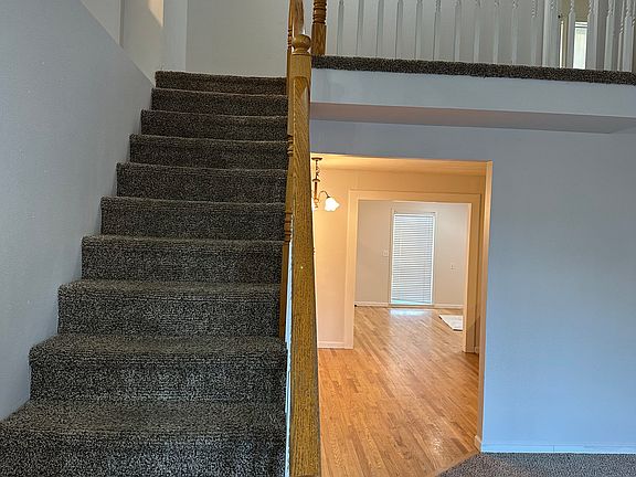 The entrance and stairs going to the master bed upstairs.