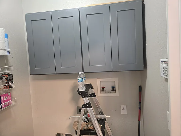 Utility Room with beautiful cabinets.