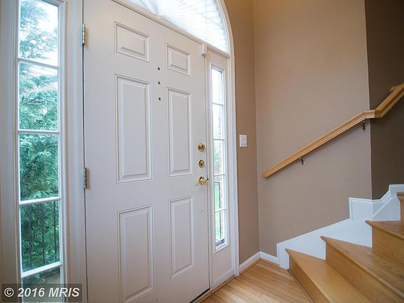 Bright Foyer with Hardwood Floors