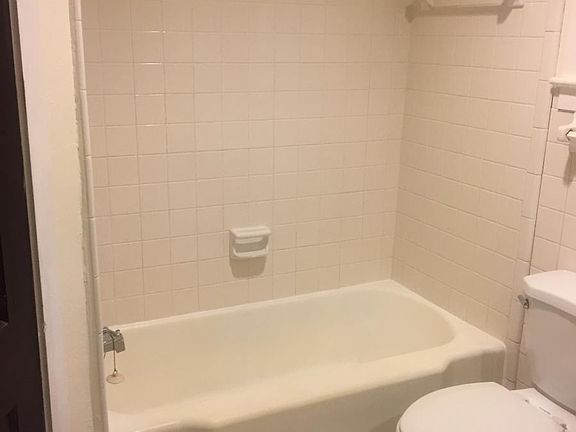 Bathroom accessible from Kitchen or bedroom. Great new vintage tile floor.