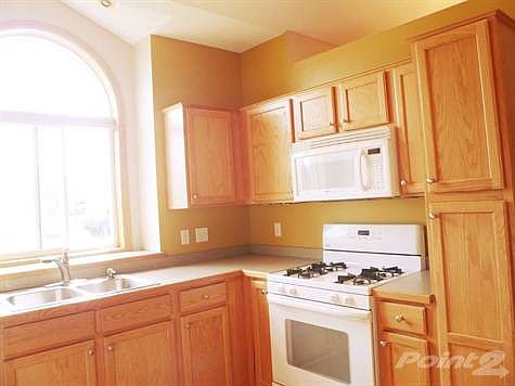 Appliances include gas range and microwave.  Thre is also a pantry cabinet for extra storage.