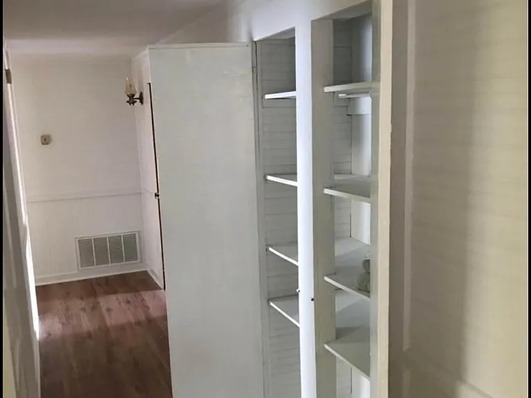 Hallway with lots of closet space