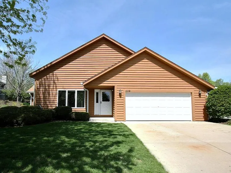 Entry and 2-car attached garage