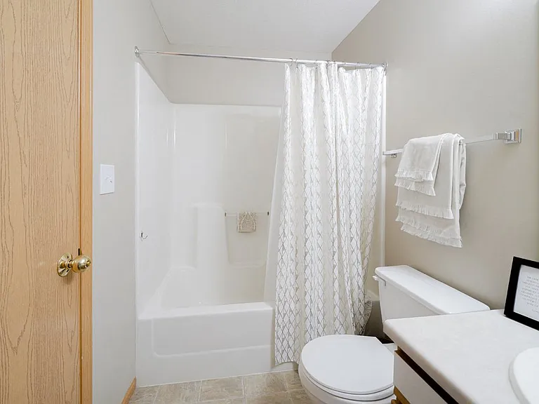 Our bathrooms feature a full-size tub and shower, perfect for relaxing and refreshing.
