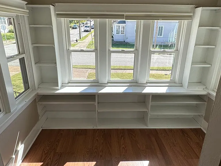 Indoor sunporch-ideal for an office space, reading nook, or extra living room space.