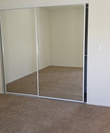 Mirrored closets in both bedrooms
