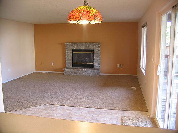 Informal dining area and family room with gas fireplace