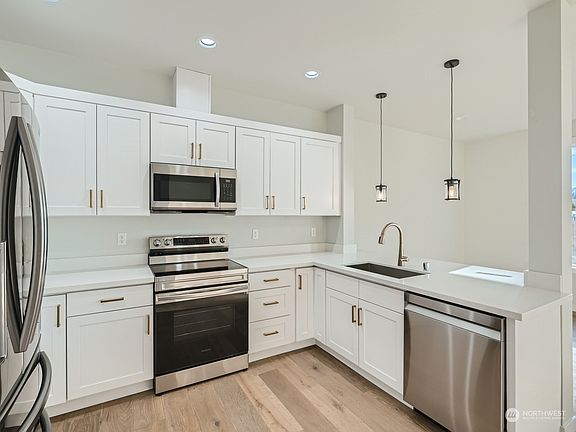 Kitchen open to Eating Space>