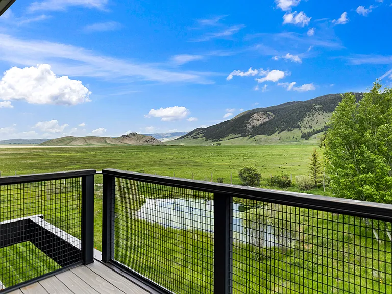 Master bedroom private balcony with uninterrupted views of National Elk Refuge.