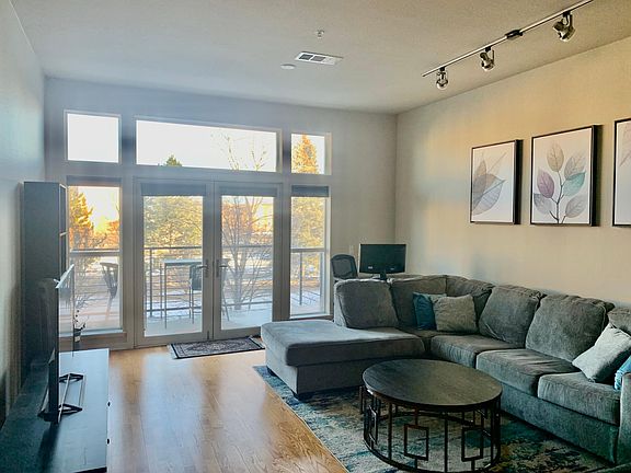 Spacious Living Room with large windows.