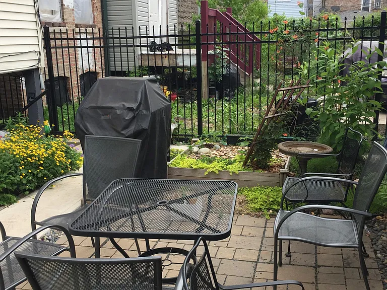 Rear garden and patio is a peaceful respite.