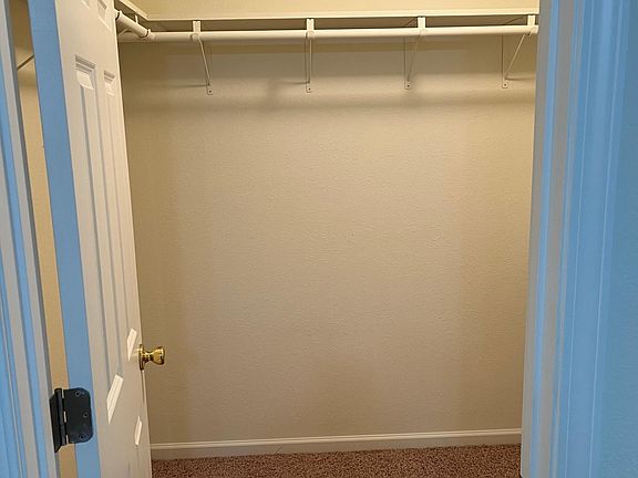 Walk-in closet in bedroom