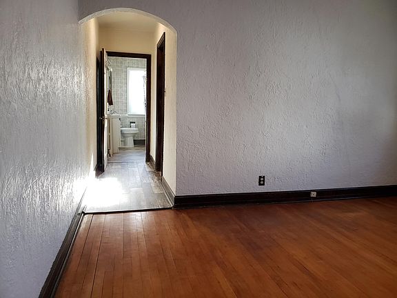 Hall leading to kitchen and bath