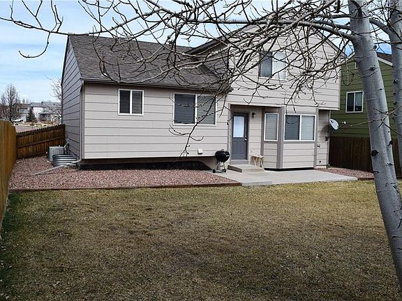 South facing rear of home, lots of natural light, Aspen trees, A.C.!