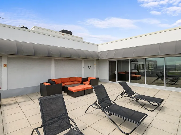 Rooftop deck with lounge chairs