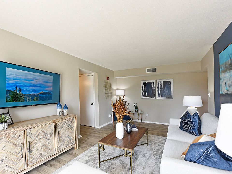 Spacious living room with hardwood-style flooring