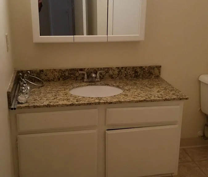 New bathroom vanity and granite countertops