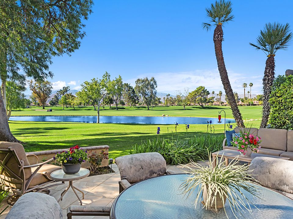 Stunning view of open space, lake and golf course
