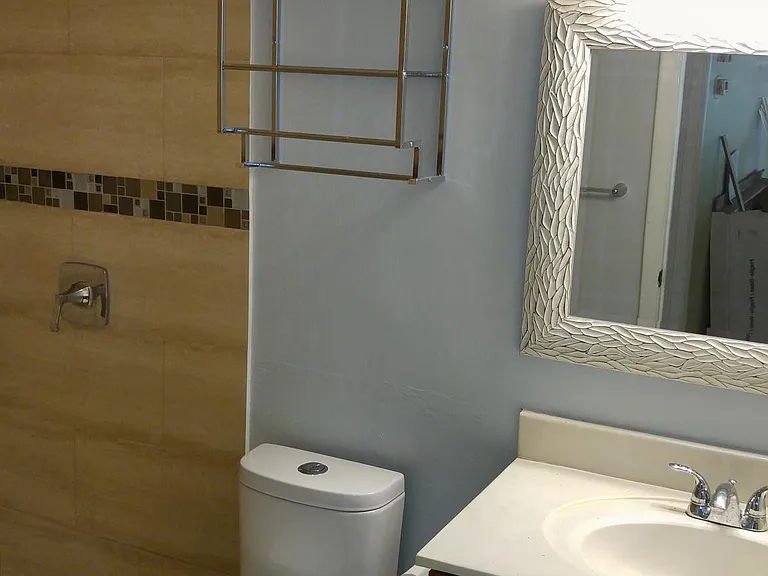Upgraded open bathroom w/ awesome lighting. Bathroom has shower and no tub.
