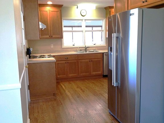 View of kitchen from den