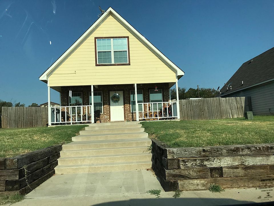 Nice front porch, brick front exterior