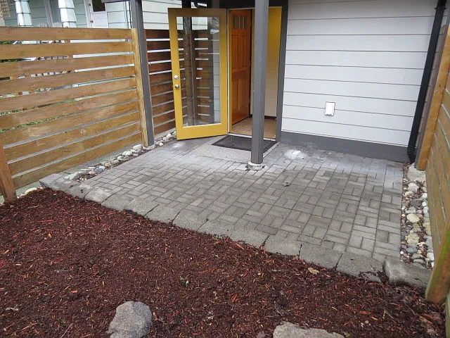 Patio for sitting outside . Enjoy the fresh air and grill in the summer