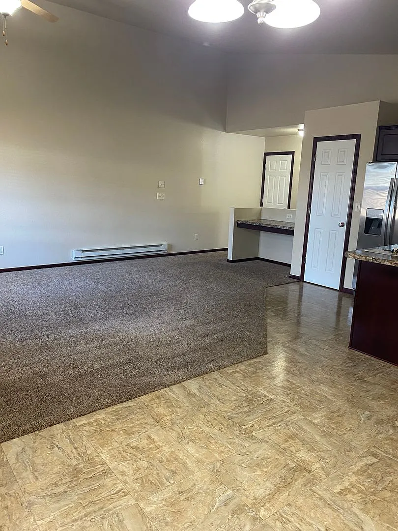 Enjoy Quiet Living In This Quality Built Twinhome — Photo 4