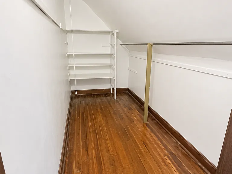 Got LOTS of clothes? Then this huge walk-in closet is perfect for you! Attached directly to the bedroom, this closet can hold it all.