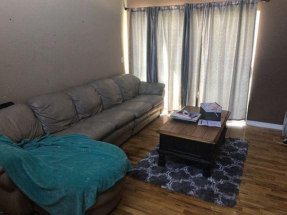 living area w/ wood floor