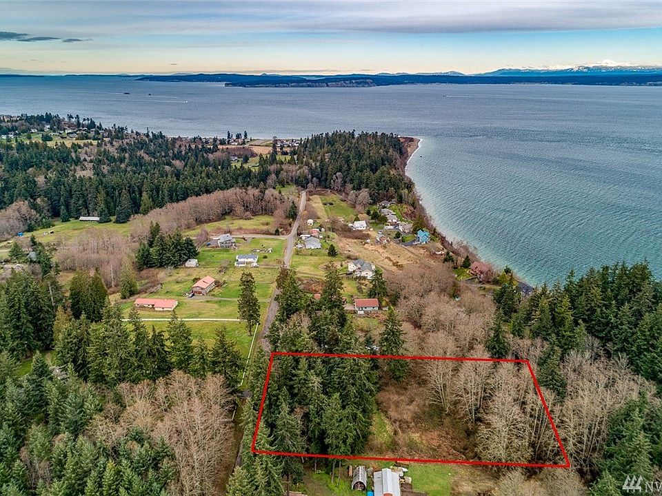 Three acres close to Point No Point. At the North end of Thors Road, right as the trees start, is a trailhead to Point No Point Lighthouse and Park. 