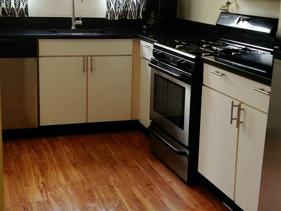 Kitchen with new granite counters, undermount sink and Traff