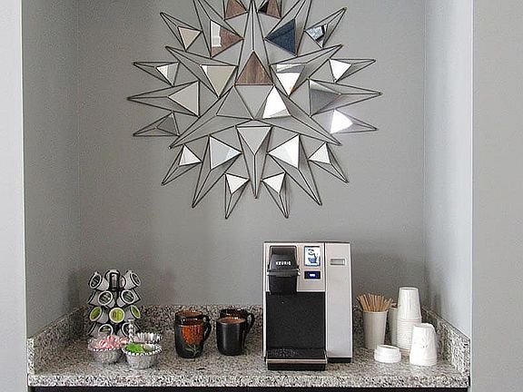 Brew a pick-me-up anytime_our resident coffee station is always open for your next cup and quick catch-up.