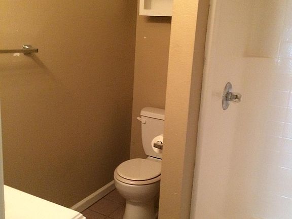 bathroom 1 with shower stall