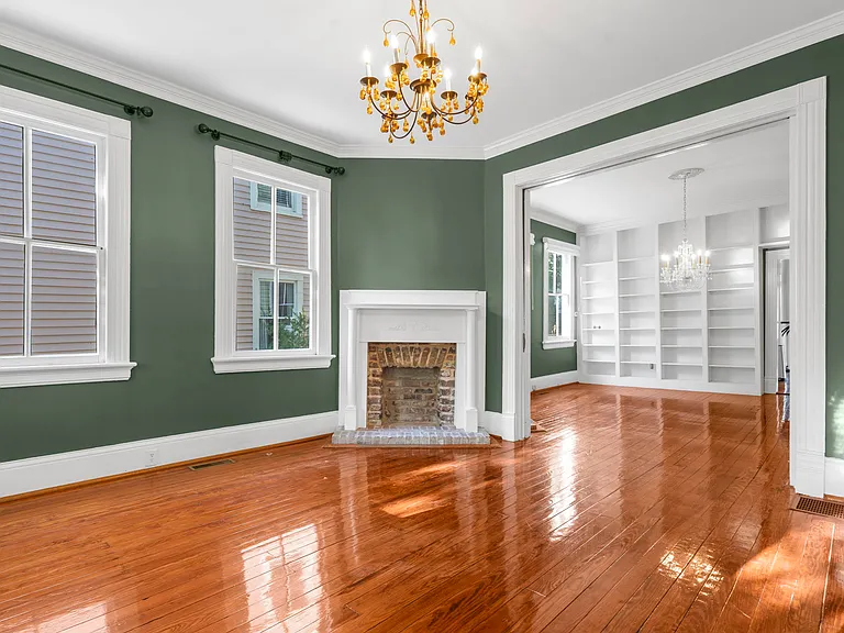 Sitting Room into Dining Room with Bookshelves