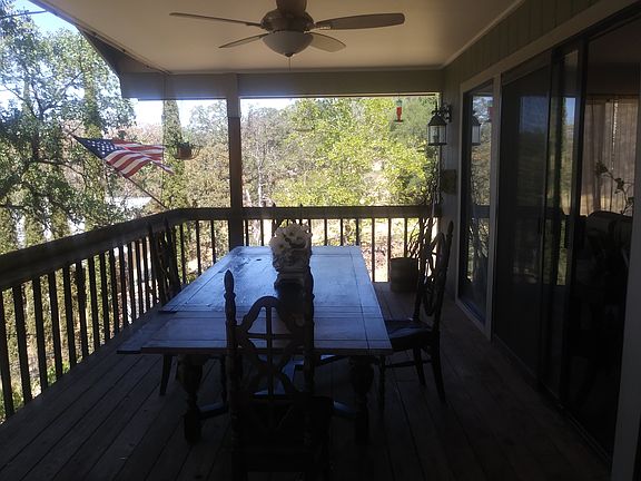 Covered front deck with fan