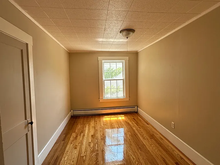 Comfortable second bedroom with closet storage