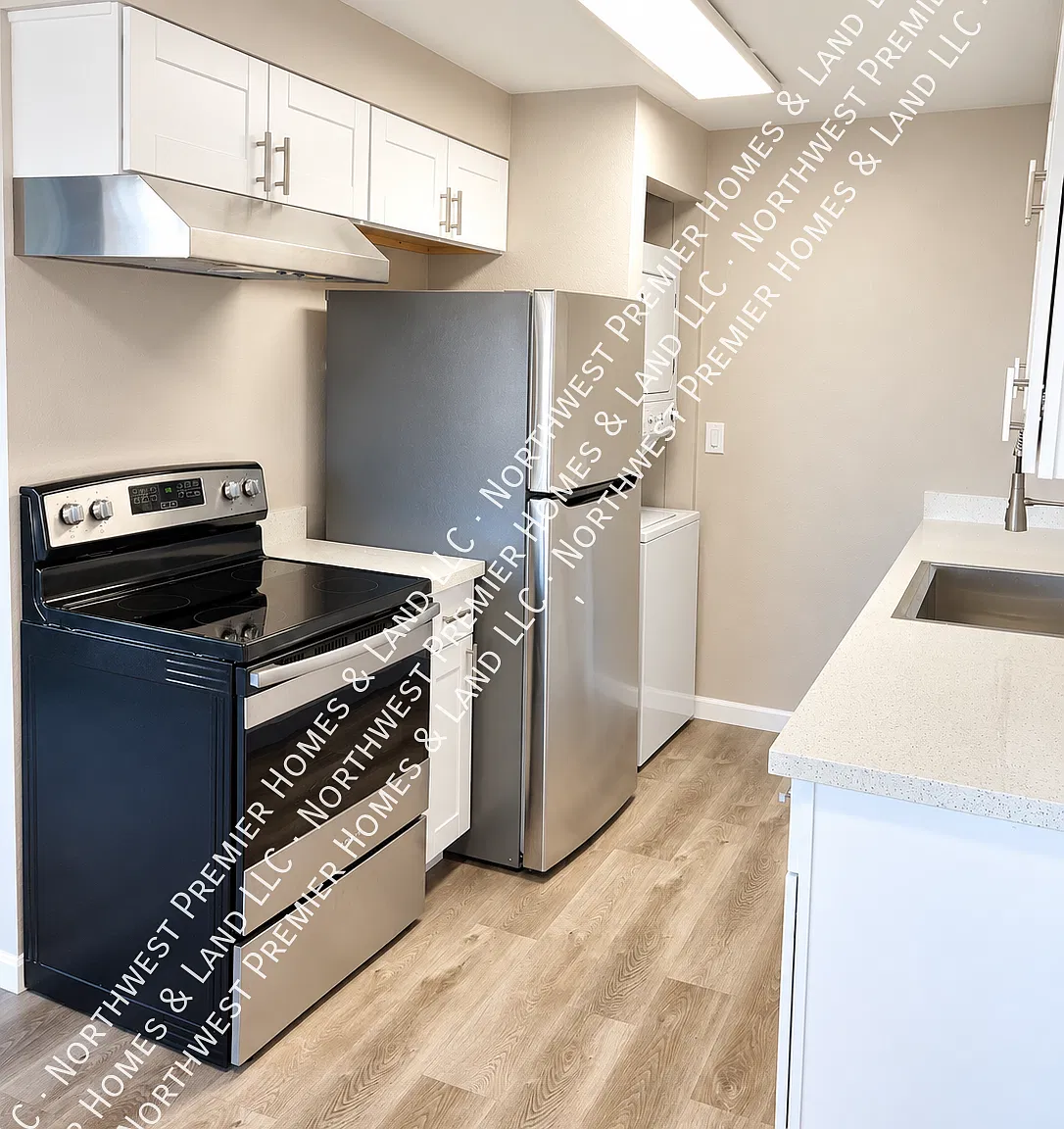NOW $1,695 | Updated Top-Floor 2BR with Washer & Dryer + Covered Deck — Photo 4