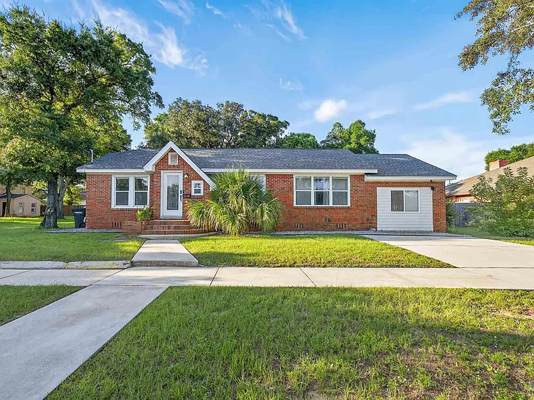 1410 W Gregory St — Photo 1