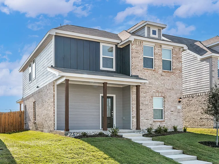 The Dogwood has a siding and brick exterior.