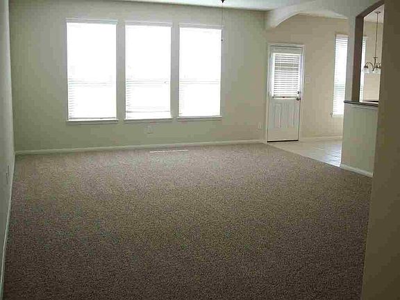 At the end of your extended tile entry you are greeted with this amazing view of your huge family room and as you look to your right your new kitchen with and breakfast area.
