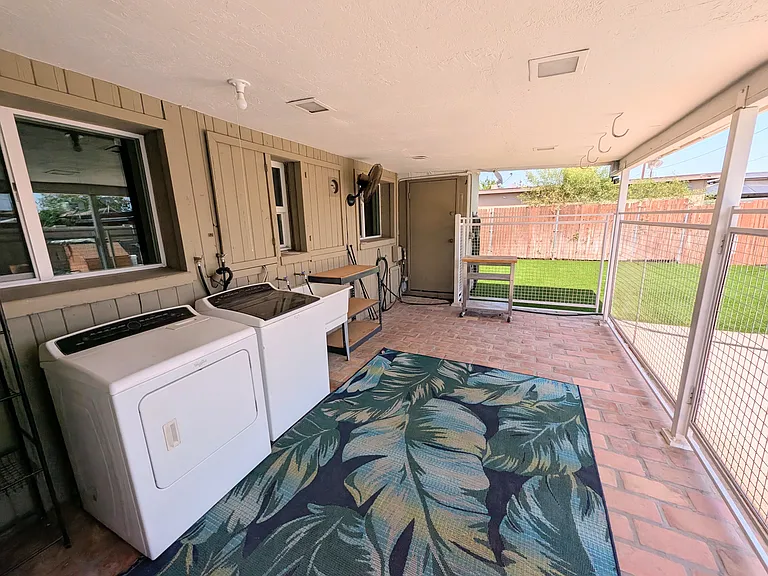 Secure patio, full size washer and dryer, outdoor storage