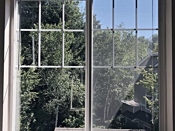 View from kitchen offers light and privacy