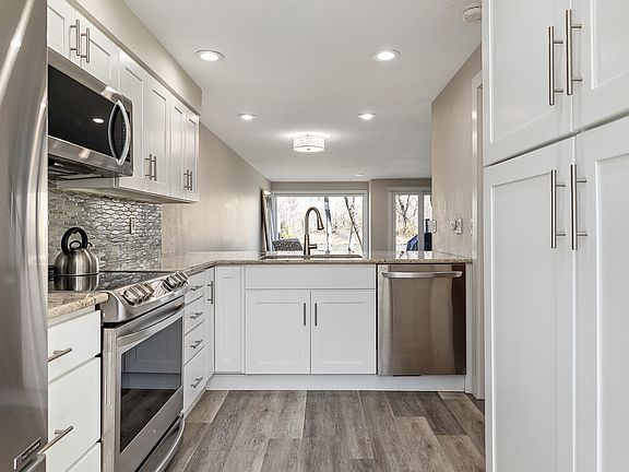 Enjoy the picturesque window view while making dinner