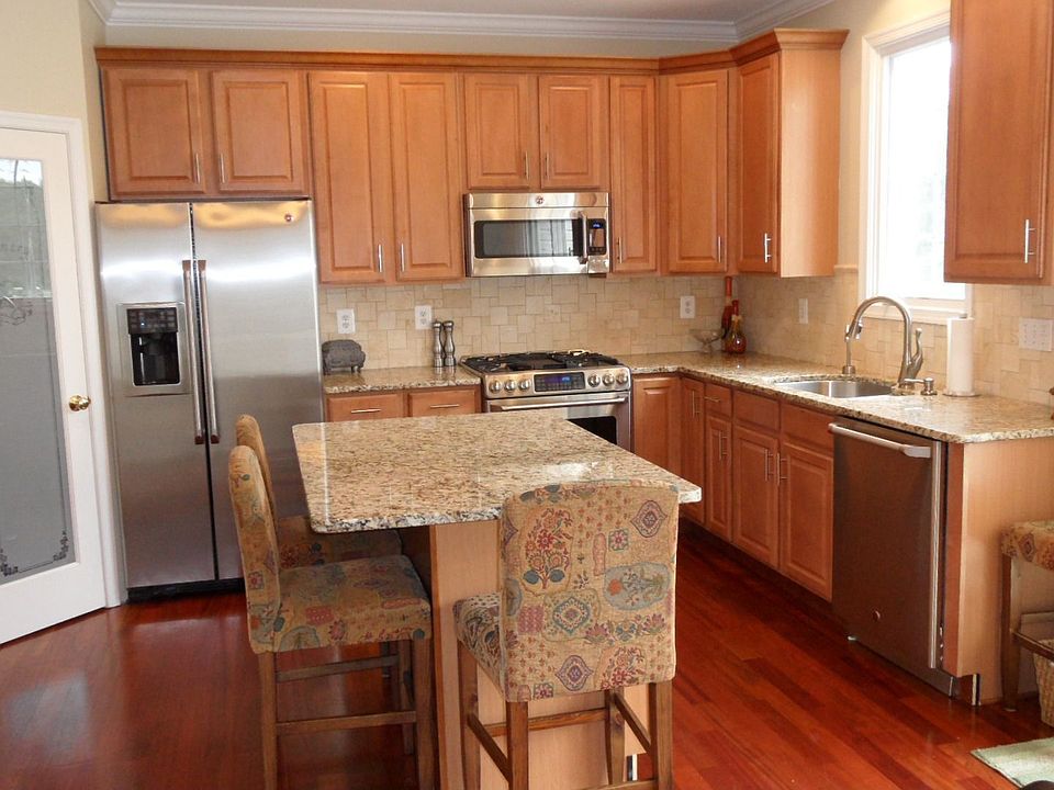 Maple kitchen, granite, professional Cafe Stainless Steel appliances