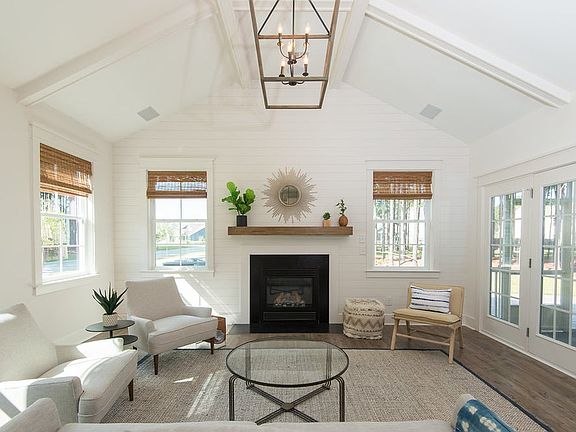 Photos are of a similar home