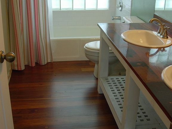 guest bath with teak floors