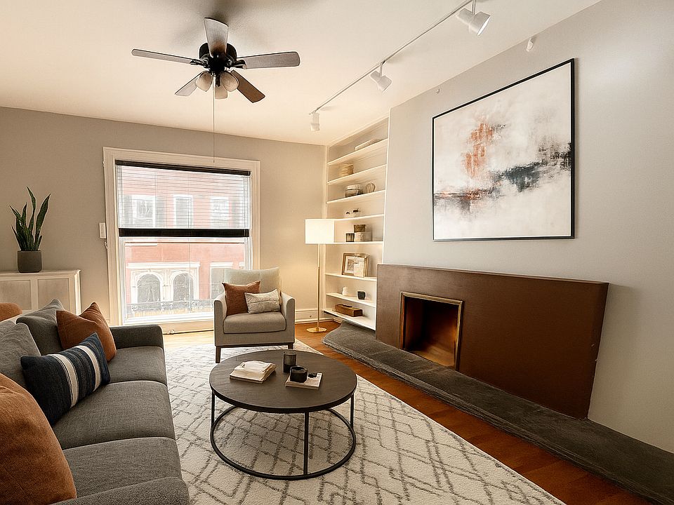 Living room with decorative fireplace