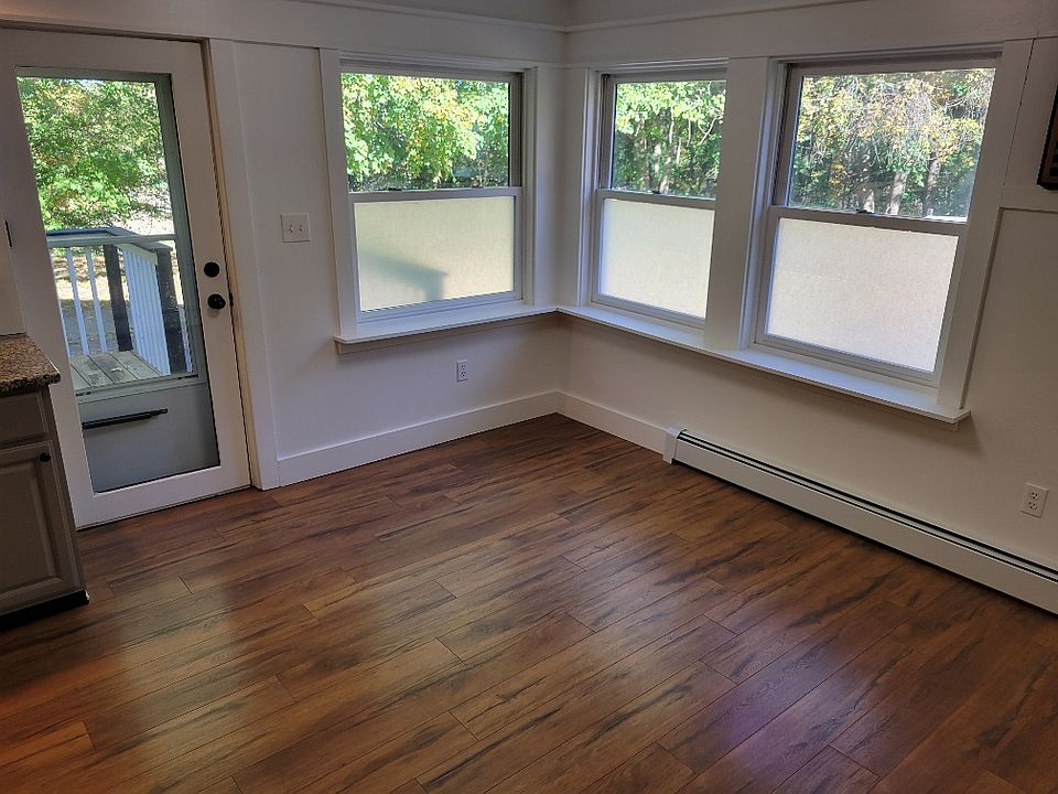 kitchen eat in area. Back door to deck