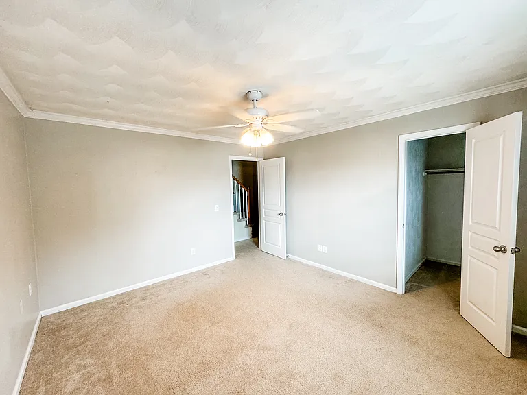 Second bedroom with walk-in closet. Freshly painted!