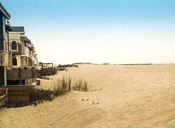 Beach looking south toward breakwater.